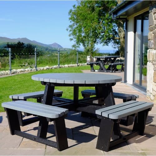 Family Hero Round 8 Seater Grey Picnic Table Lifestyle